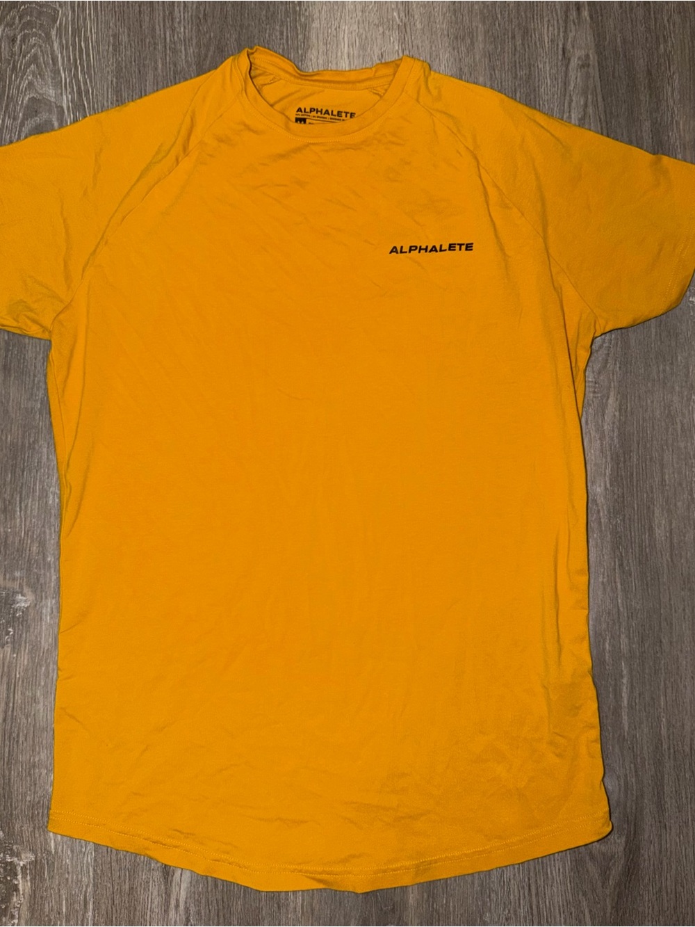 Alphalete Short Sleeve Crew Neck Tee in Mustard Yellow